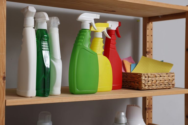 colorful-spray-bottles-and-rags-on-wooden-shelf-2026-06-16-06-29-08-utc